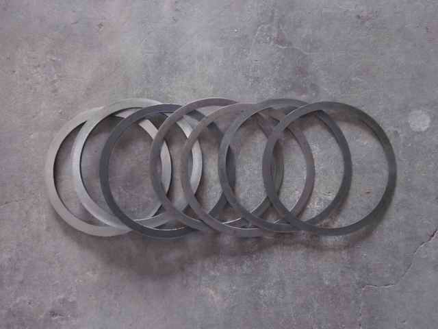 Регулировочная прокладка активного конического подшипника; содержит 12 куски