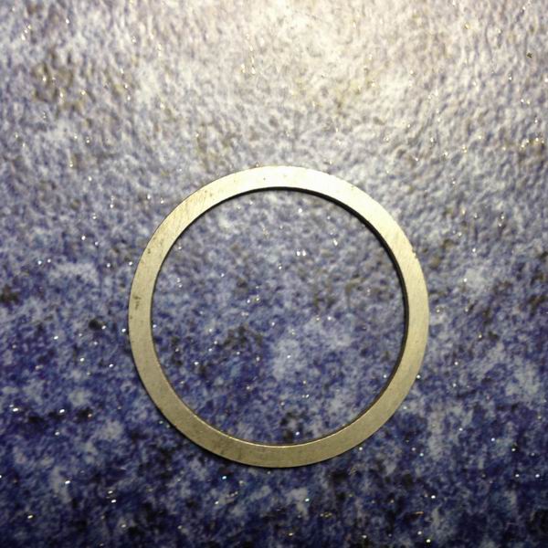 Active bevel bearing adjustment gasket