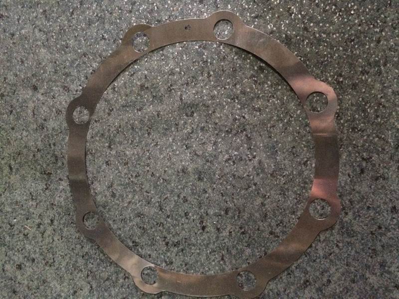Bearing seat adjustment gasket