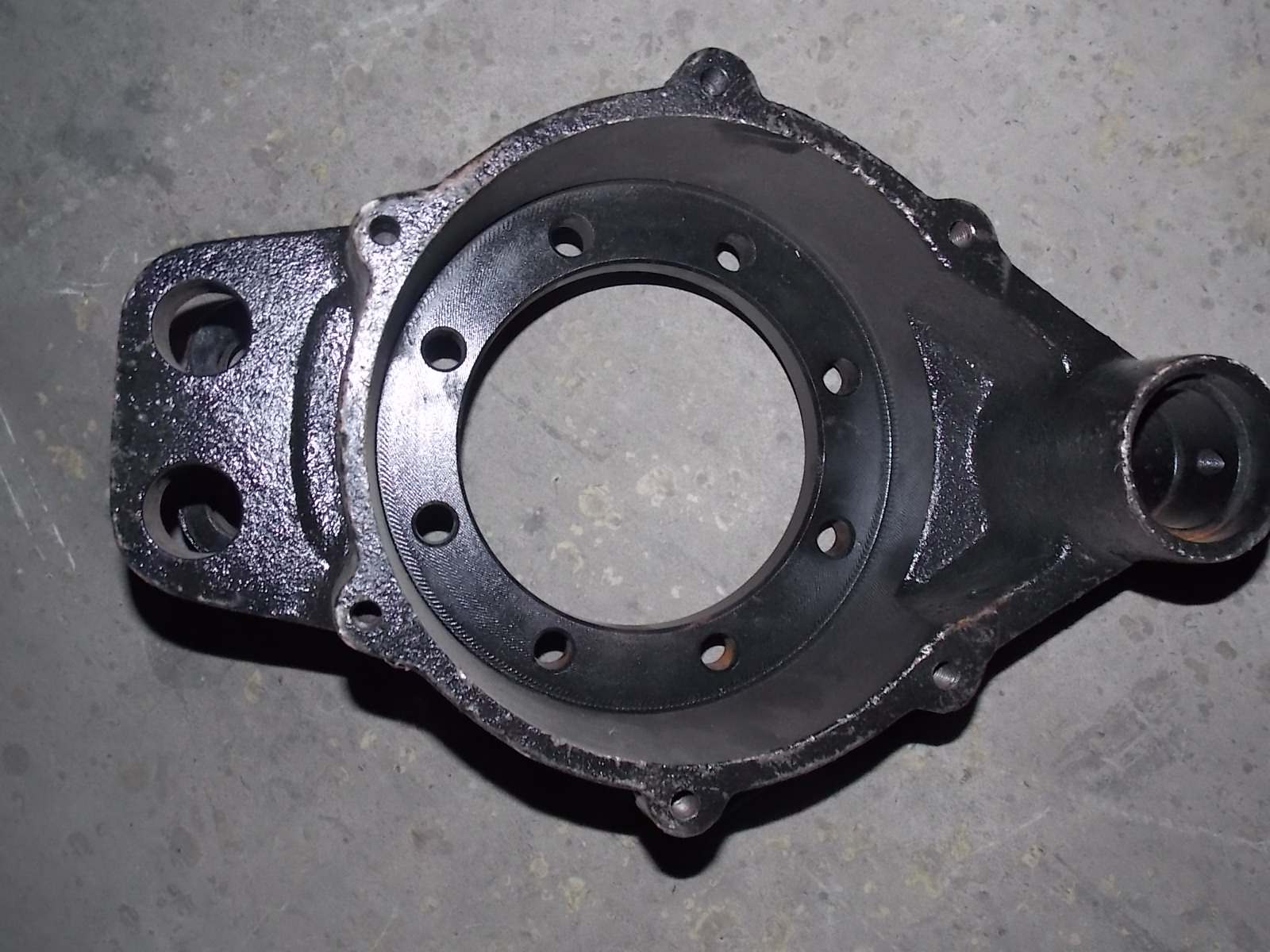 Rear brake base plate assembly