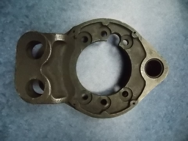 Rear brake base plate-left