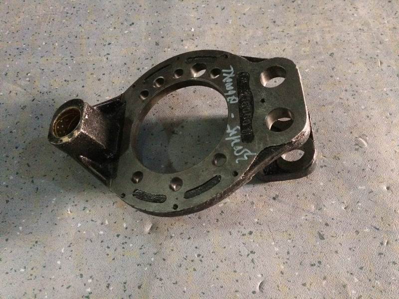Rear right brake base plate assembly
