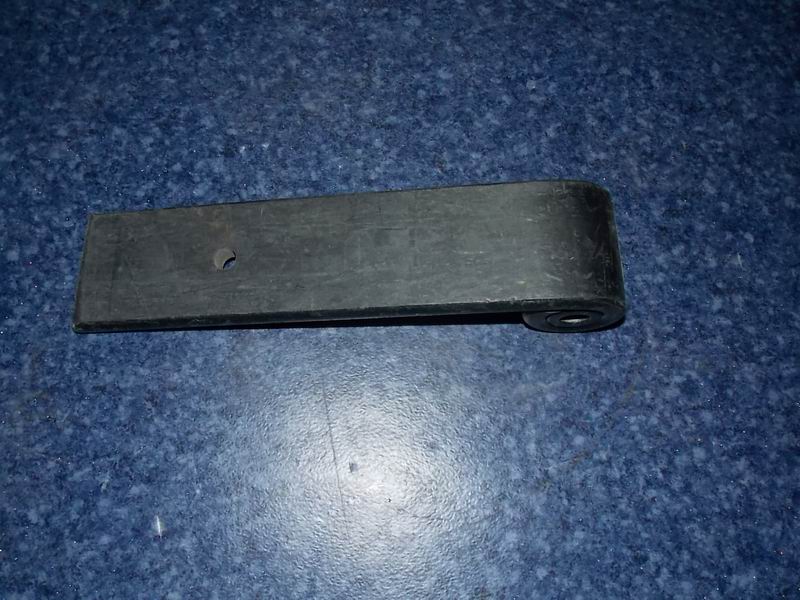 Shock absorber lower bracket with bushing