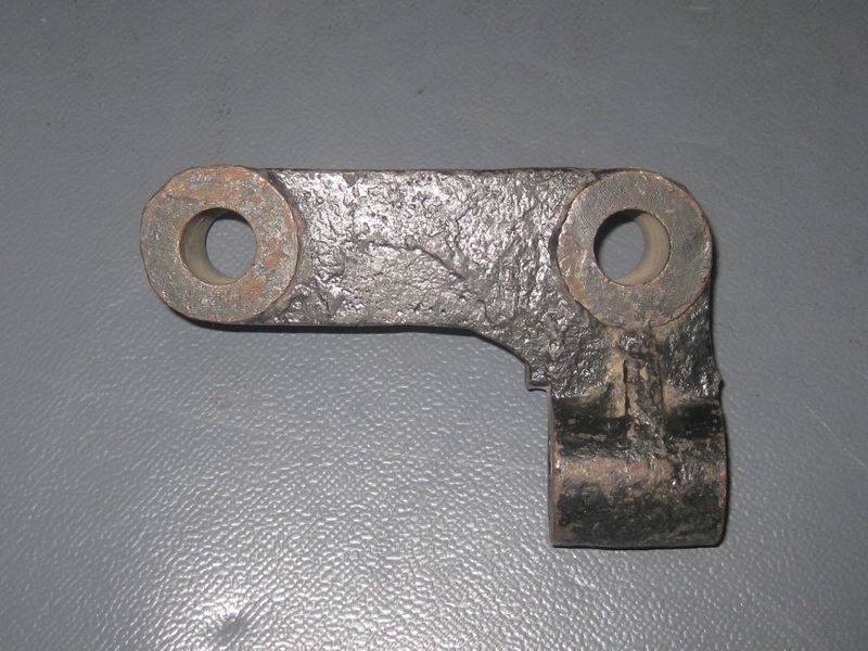 Front shock absorber lower bracket left universal