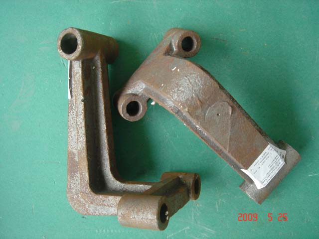 Lower bracket - front shock absorber