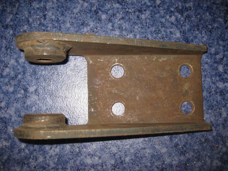 Rear shock absorber lower bracket