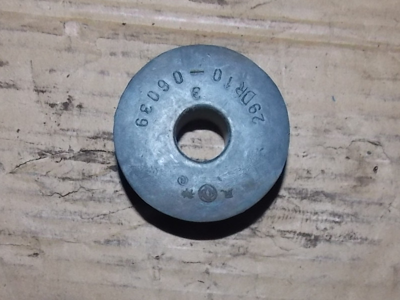 Boom upper end bushing