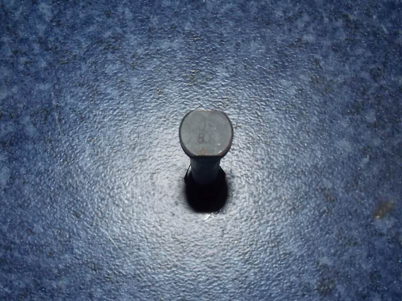 Rear steel spring center bolt