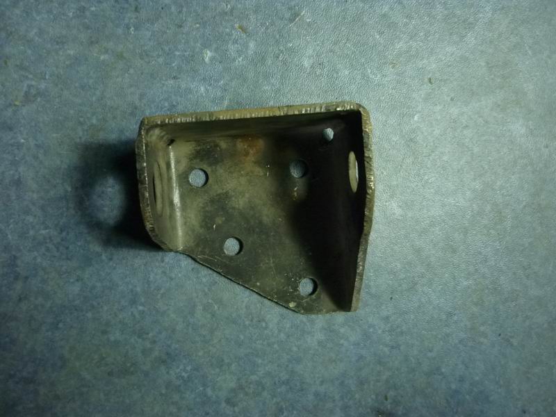 Rear shock absorber upper bracket