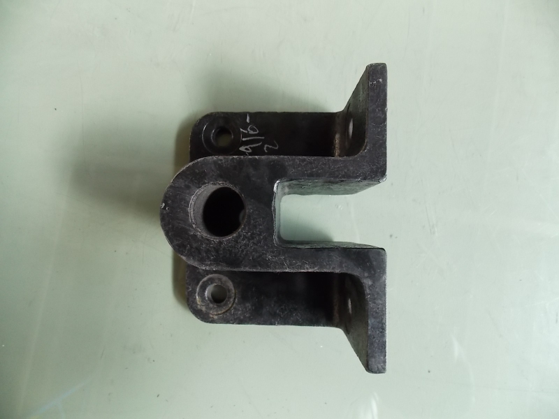 Shock absorber bracket (process 20)* without paint