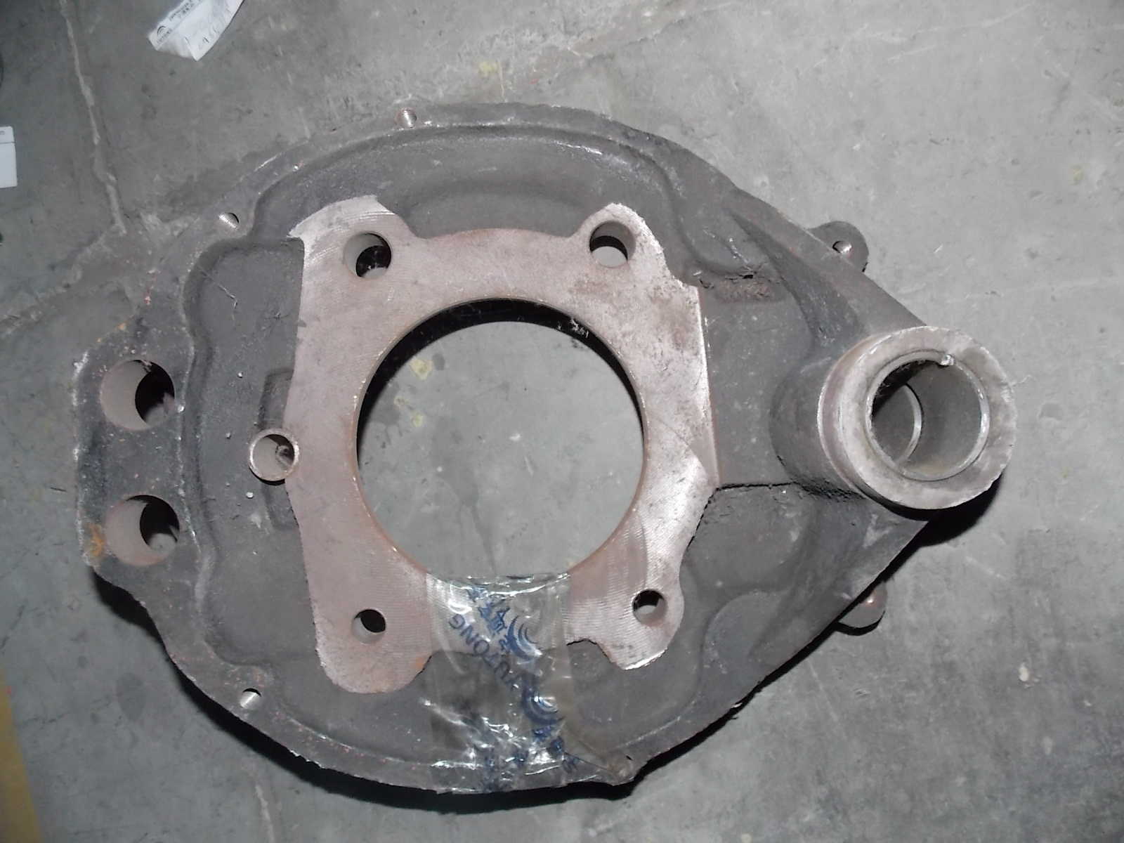 Front right brake base plate assembly; consume inventory