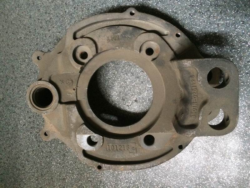 Front left brake base plate assembly