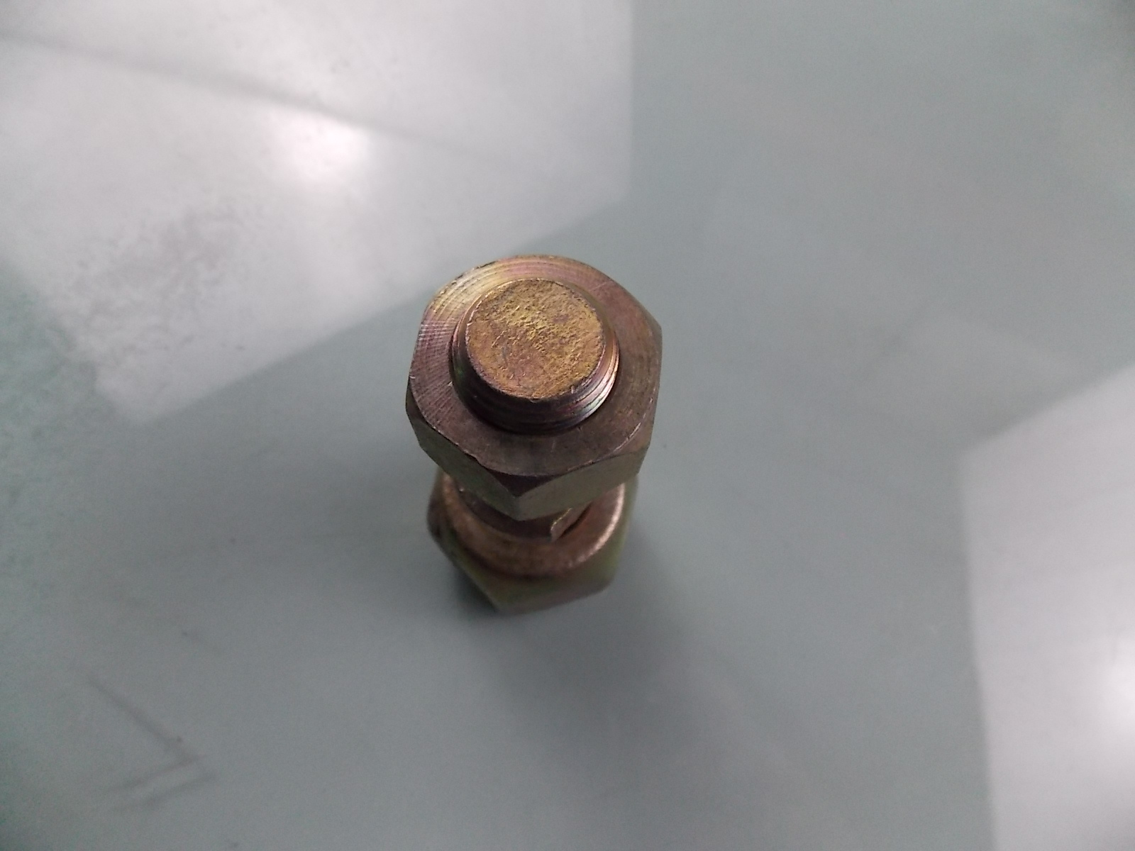 Гайка болта переднего колеса Правая-2