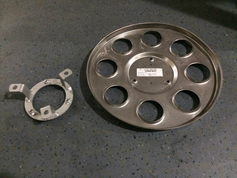 Rear wheel cover assembly; hole opening-1