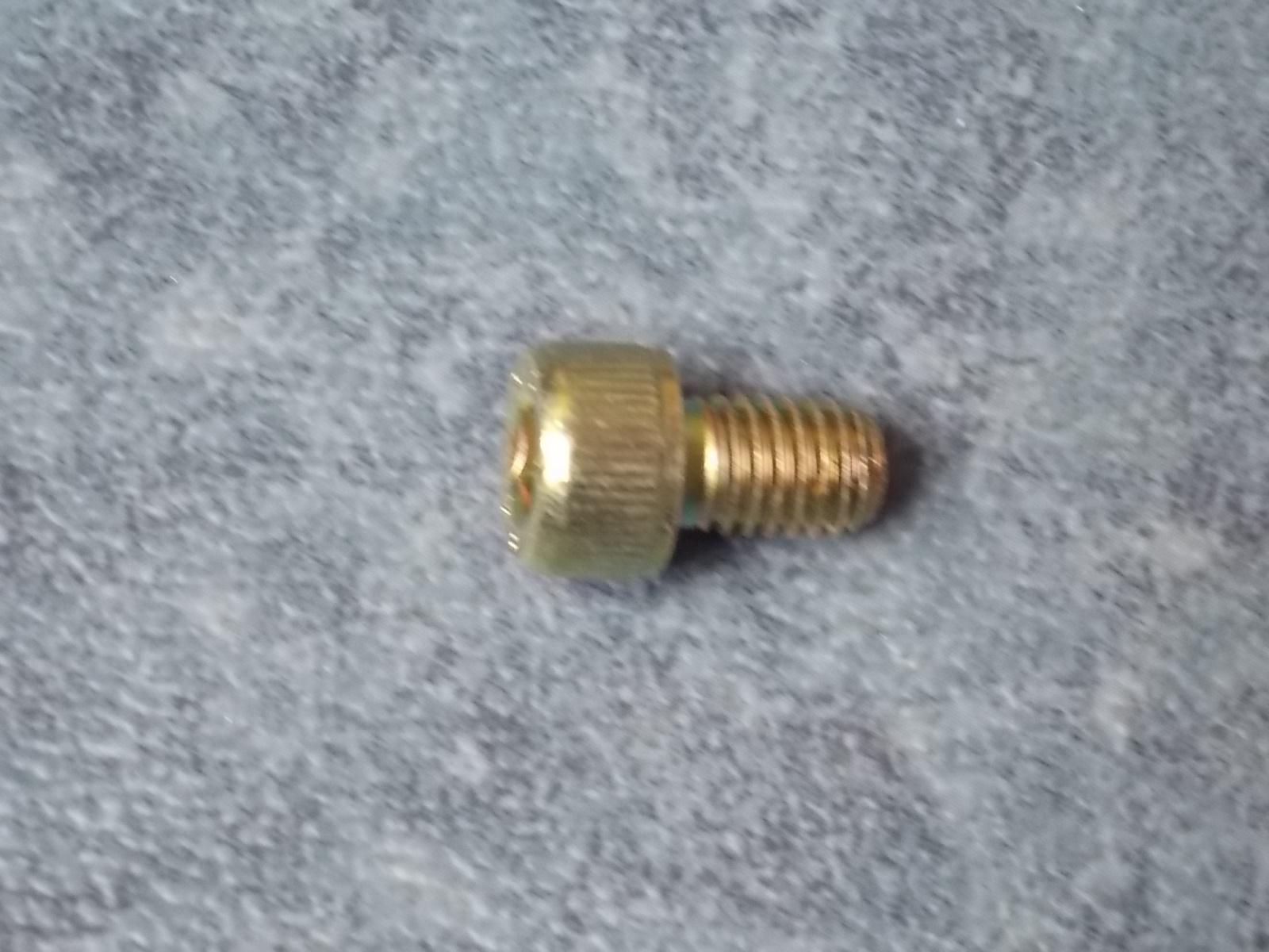 Hub cover bolt; can be replaced by 3103-00969