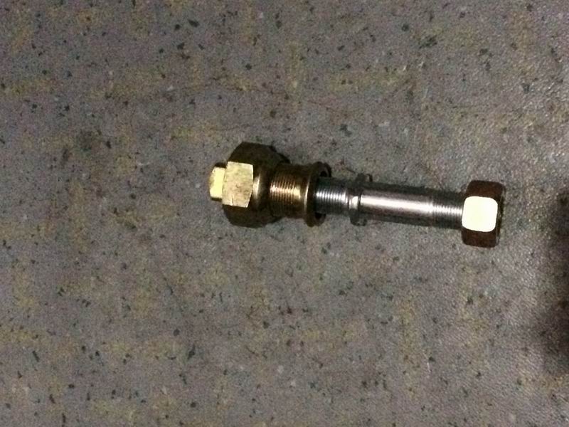 Front wheel bolt nut - left