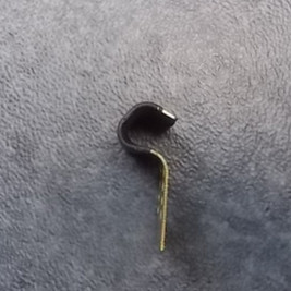 Пружина колпака колеса