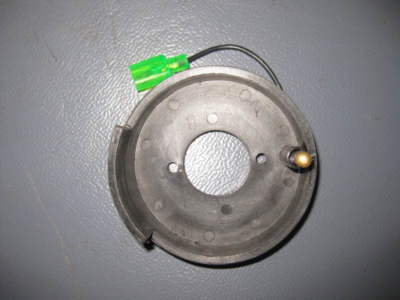 Steering wheel return device