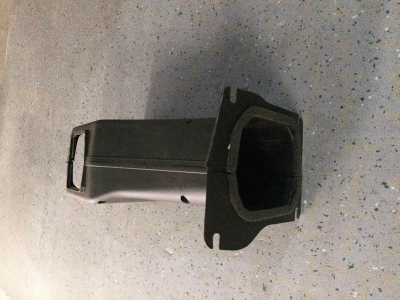 Steering column shield assembly