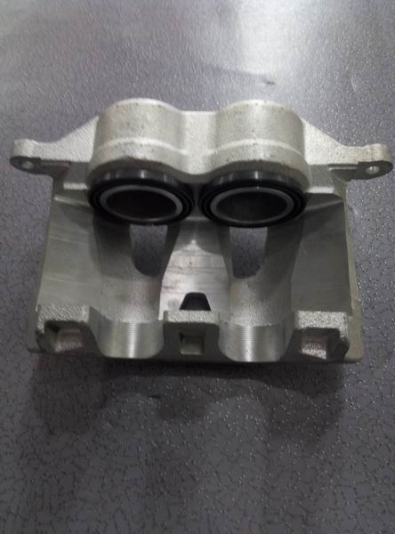 Caliper housing assembly-right