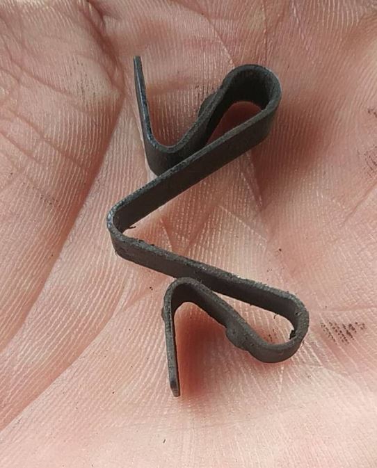 Friction plate pressure plate limit buckle