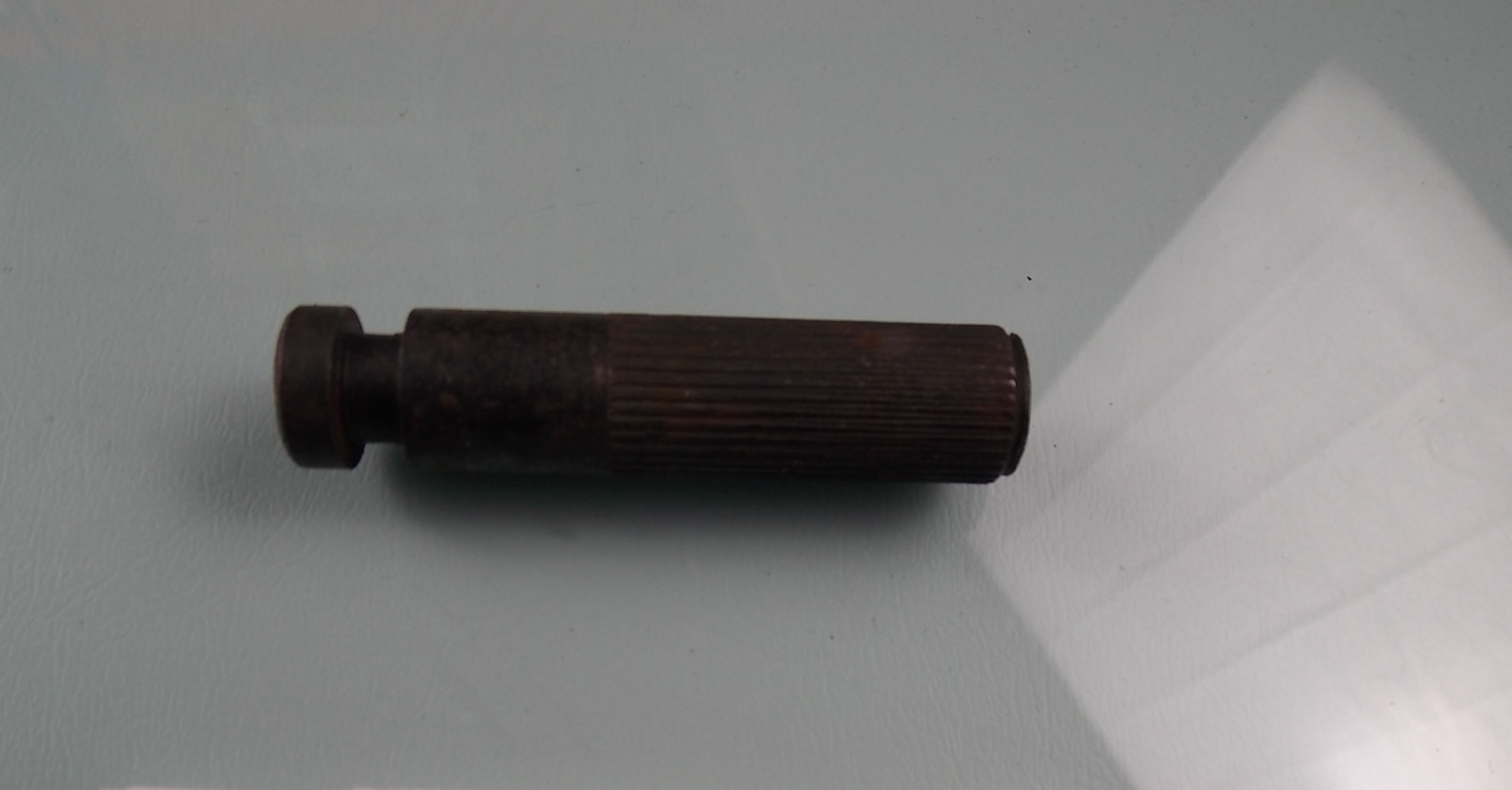 Brake spring fixing pin