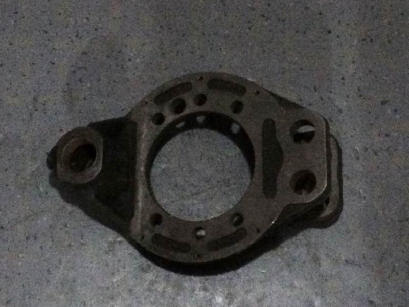 Rear right brake base plate assembly