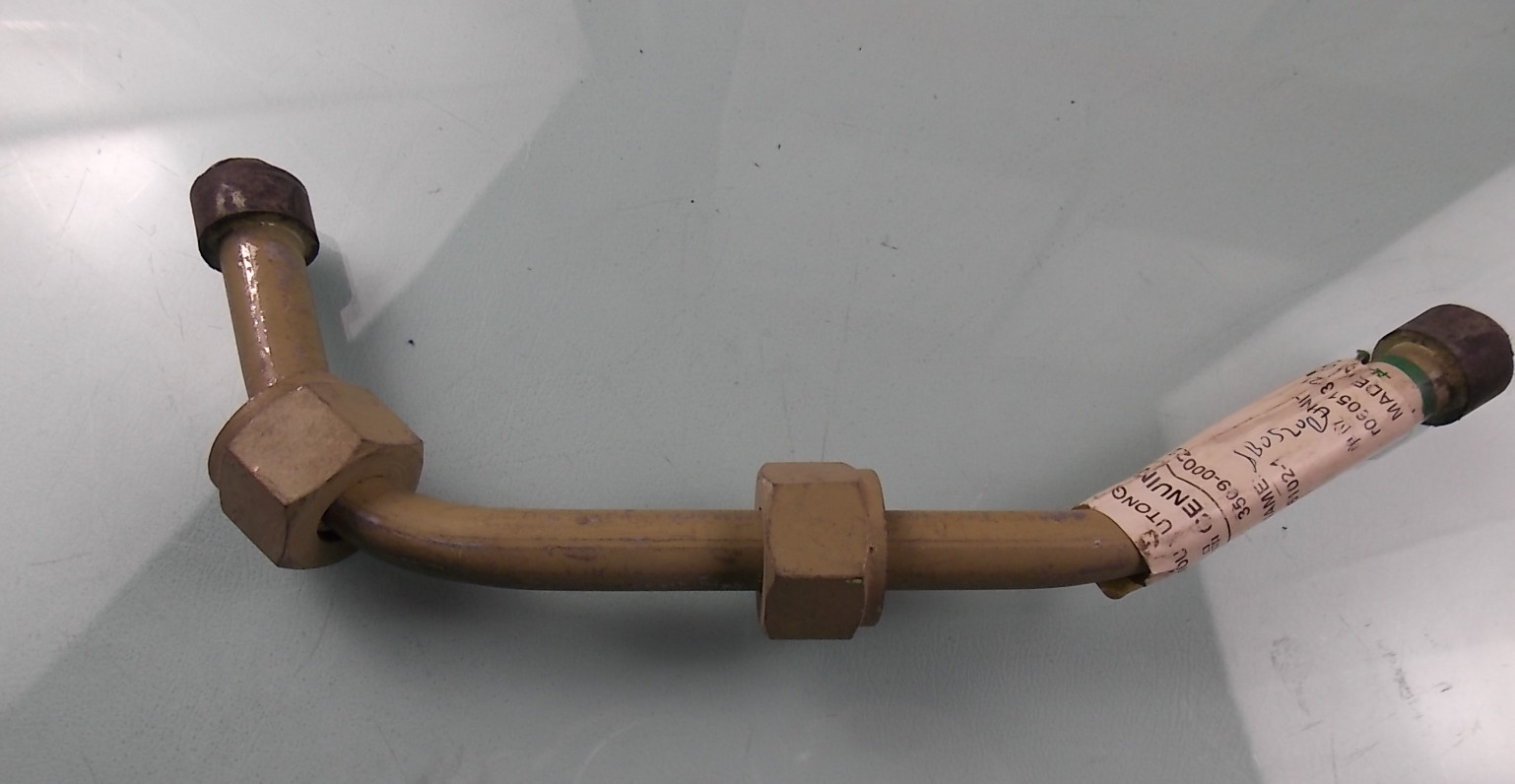 Air compressor oil return pipe