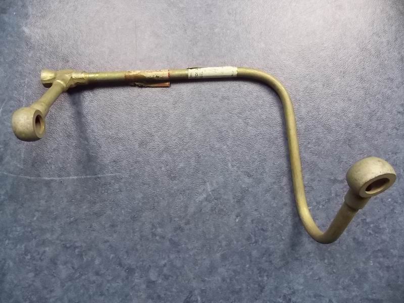 Air compressor return pipe