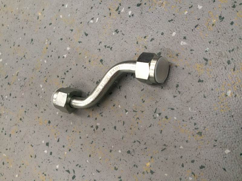 Air compressor oil return pipe