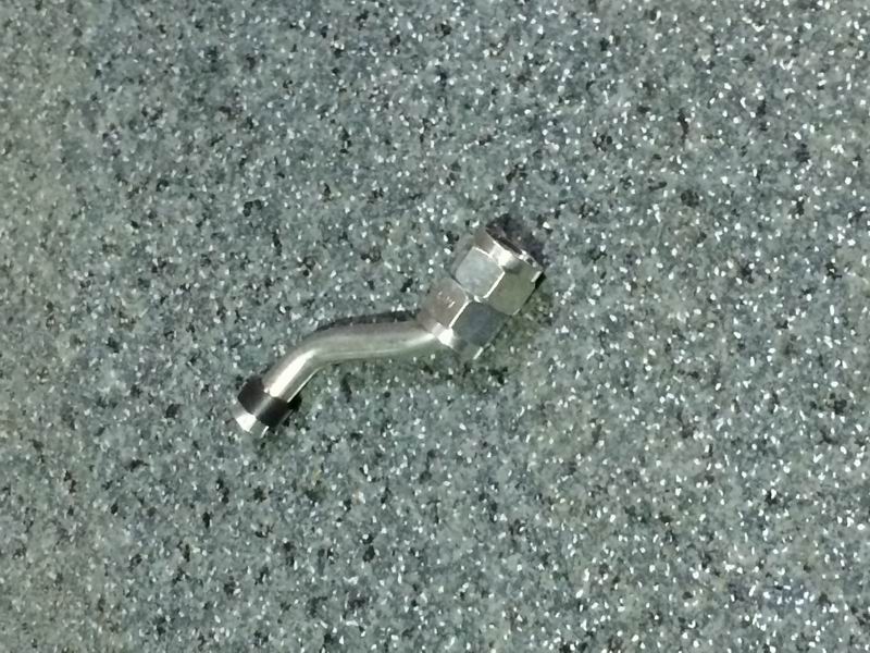 Air compressor oil return pipe