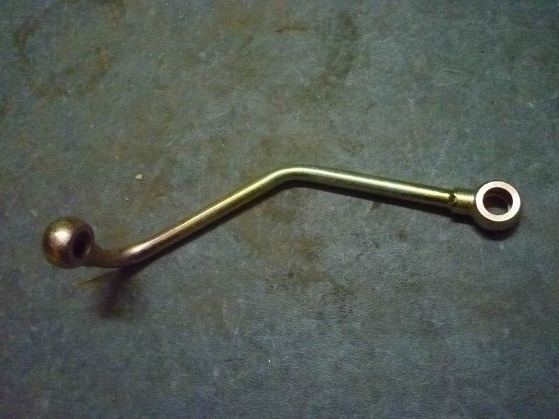 Air compressor return pipe