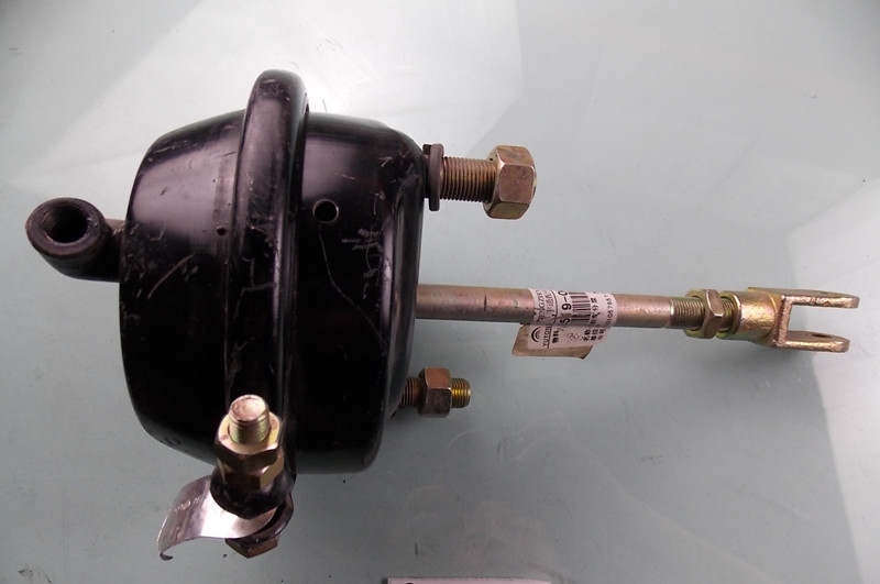 Front brake air chamber assembly-left; new