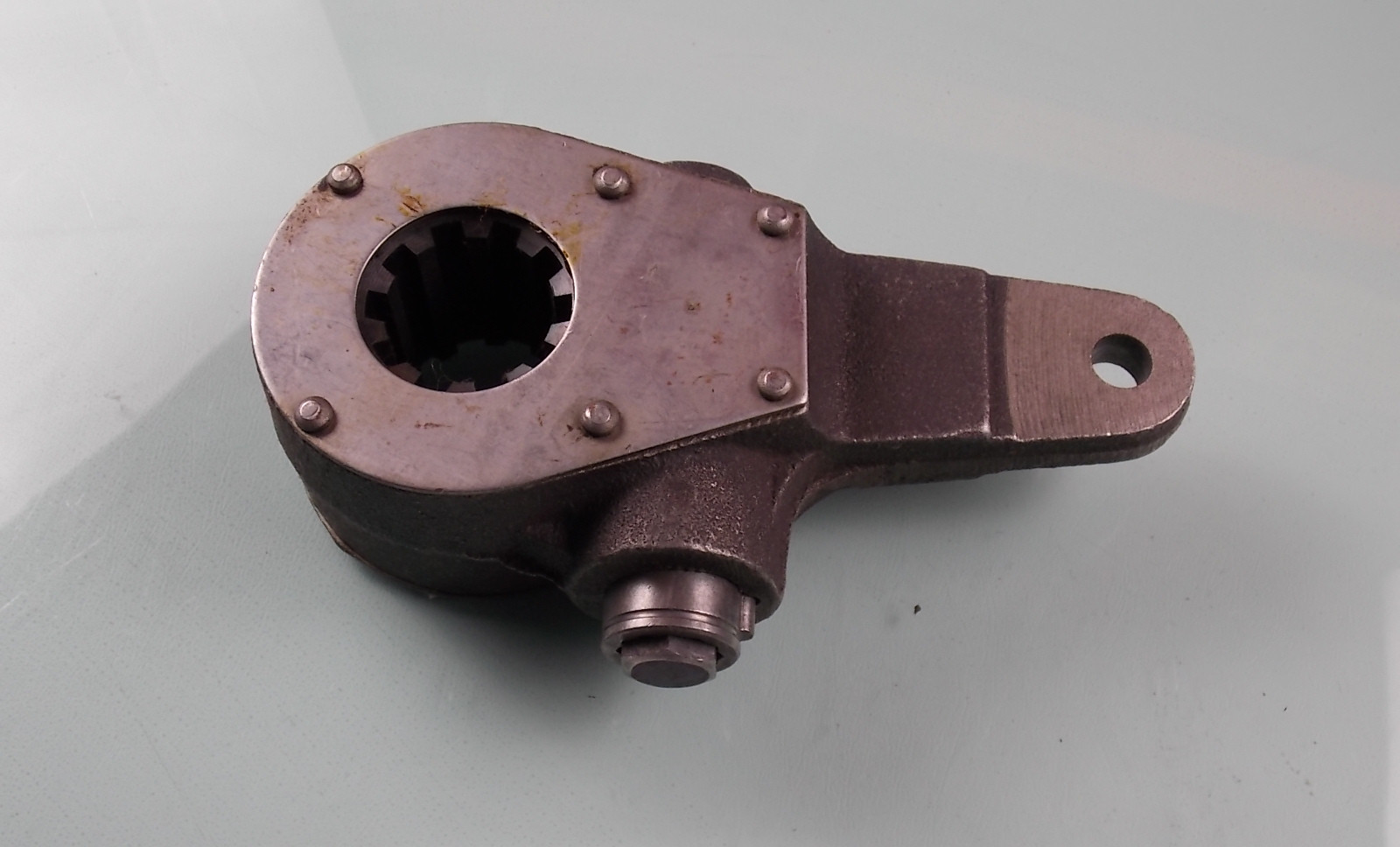 Rear brake adjustment arm