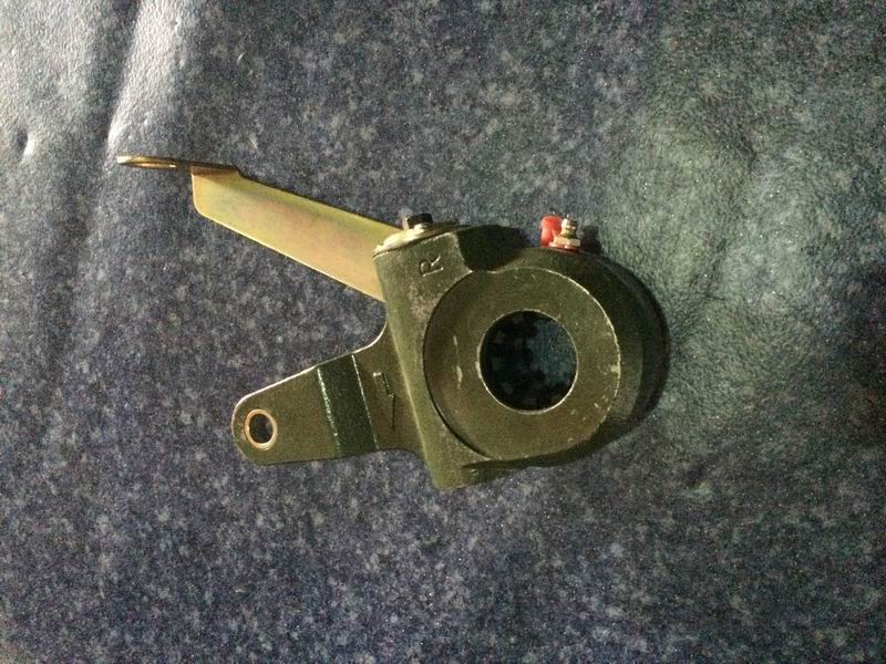 Rear right adjustment arm