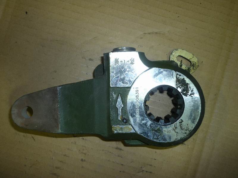 Front left adjustment arm