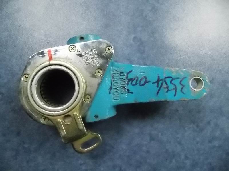 Передний левый рычаг автоматической регулировки-1