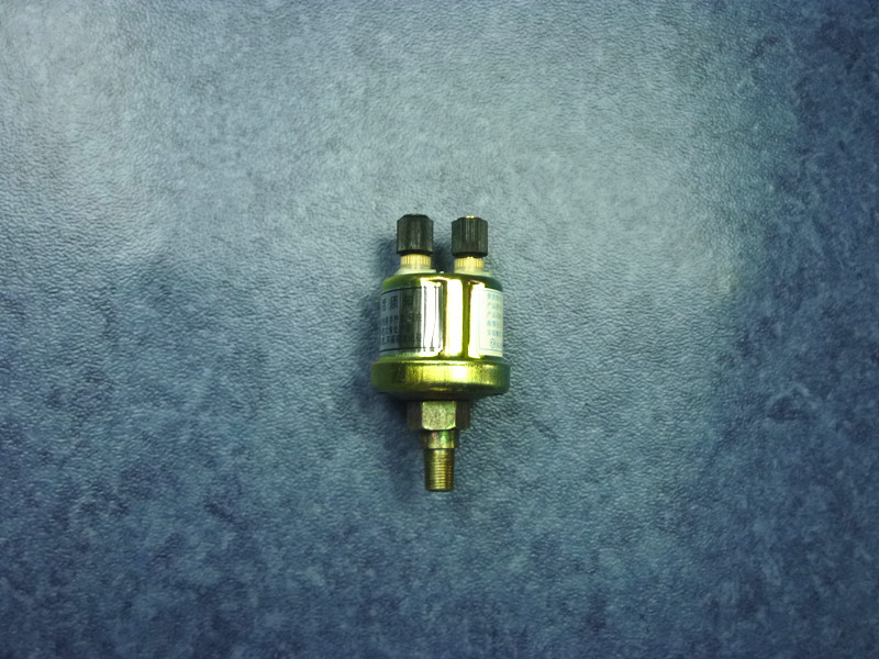 Alarm pressure sensor assembly