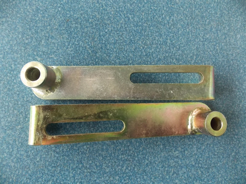 Generator adjustment arm assembly