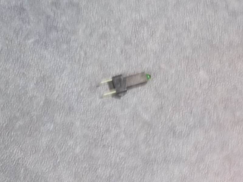 Light emitting secondary level for rocker switch (24v) green