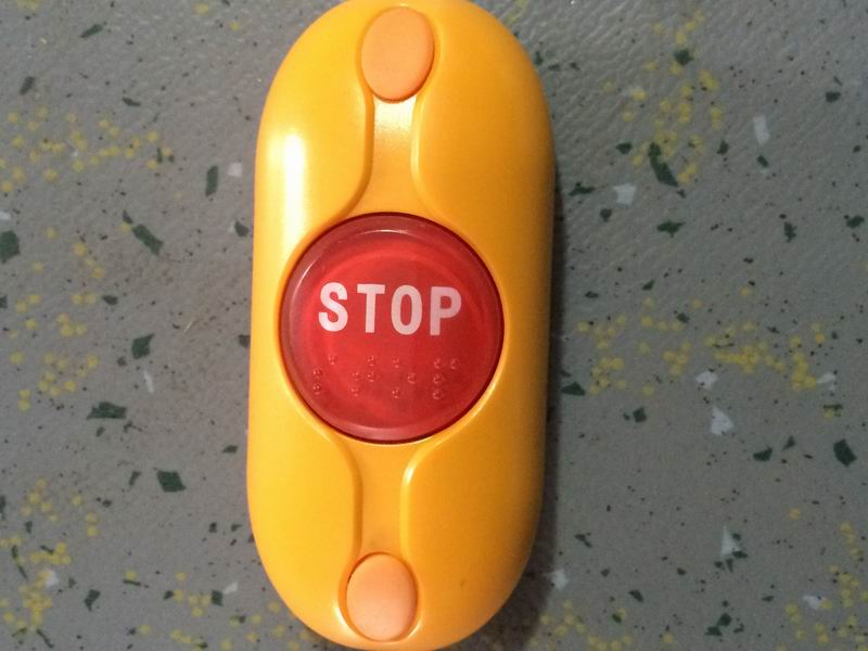 Get off bell button Yellow curved housing Red button Wireless