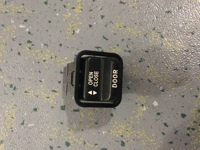 First passenger door rocker switch JK999 A