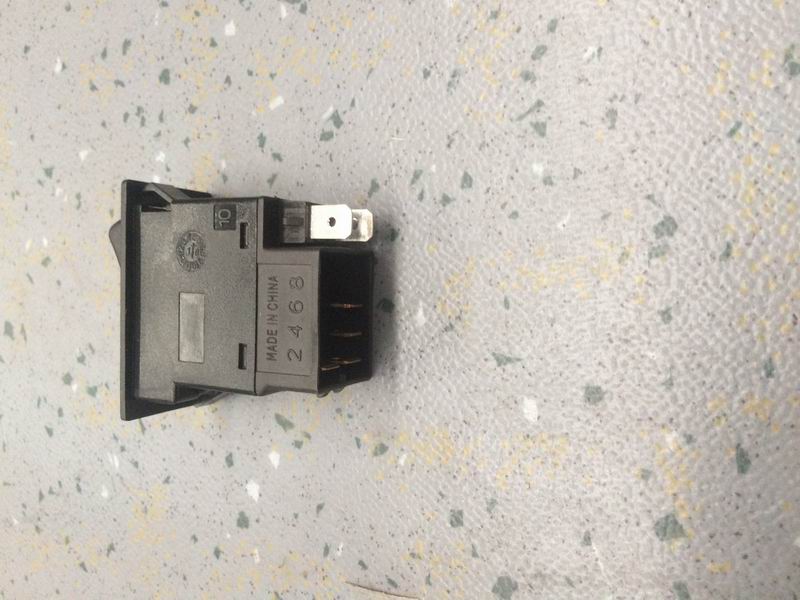 Passenger door defrosting rocker switch