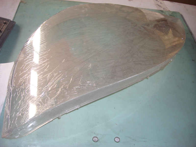 Left headlight lamp shade; LION3711111