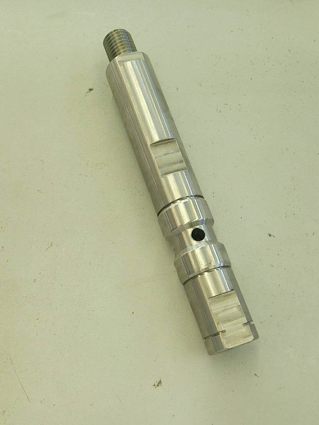 Central shaft assembly; for 82210 reel pipe disc; delete