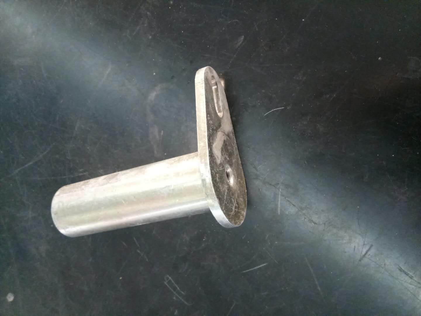 Scraper cylinder under pin welding