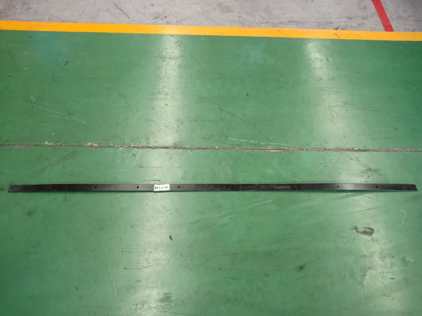 Rear rubber baffle press plate