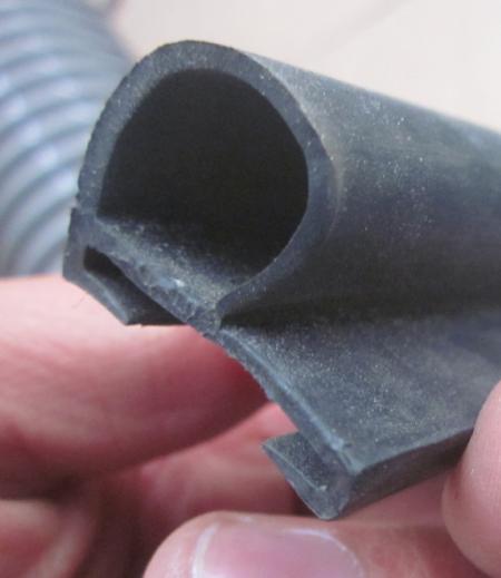 Black sliding inclined D seal strip