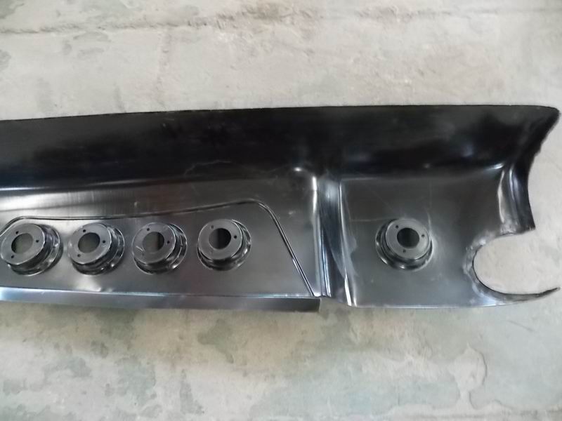 Left corner skin covering (with exhaust tailpipe hole)