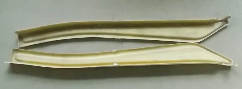 Long decorative parts on the right side of the front windshield center frame (with stamping)